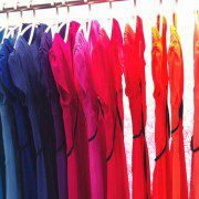A rainbow rack of dresses
