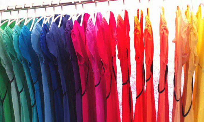 A rainbow rack of dresses