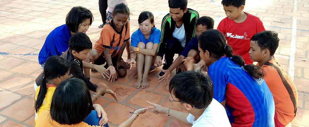 Group of children playing in a circle