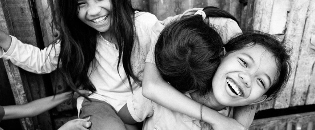 Sisters laughing with each other