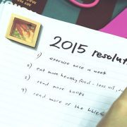 Individual writing down their new years resolutions