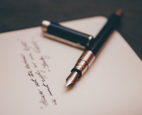 Letter with pen - confessions of a single guy