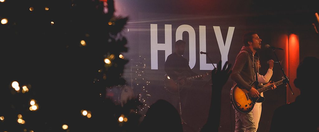 Band performing on-stage at Christmas time