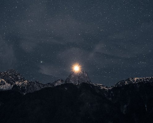 North star rising over a mountain peak