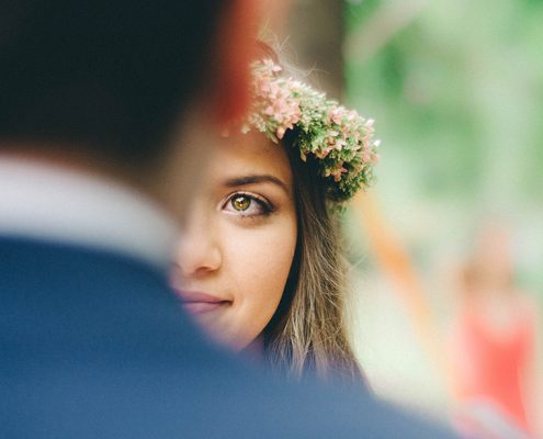 Bride looking into her groom's eyes