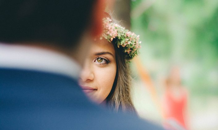 Bride looking into her groom's eyes