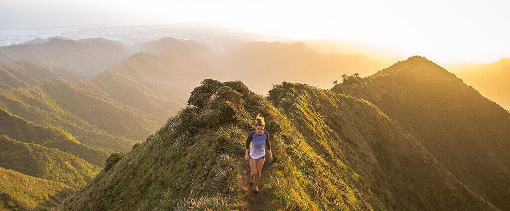 Woman running on a hill