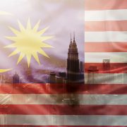 Malaysian flag overlaid the skyline