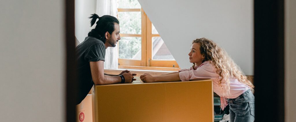 A couple in conversation at home