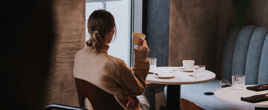 image of a woman in a cafe