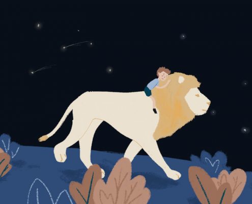image of a boy and a lion at night