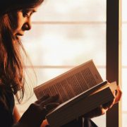 A girl is reading bible