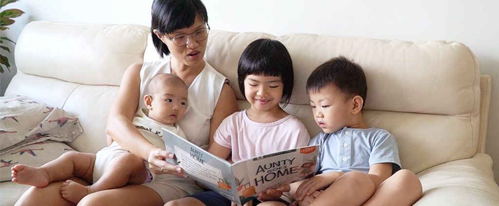 Image of lady with her 3 children