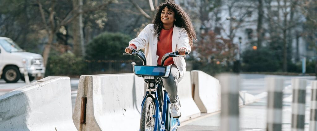 A girl happily cycling around