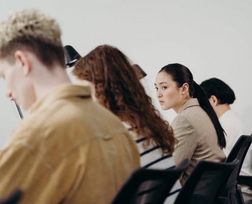 A woman is looking at others get promoted but not herself