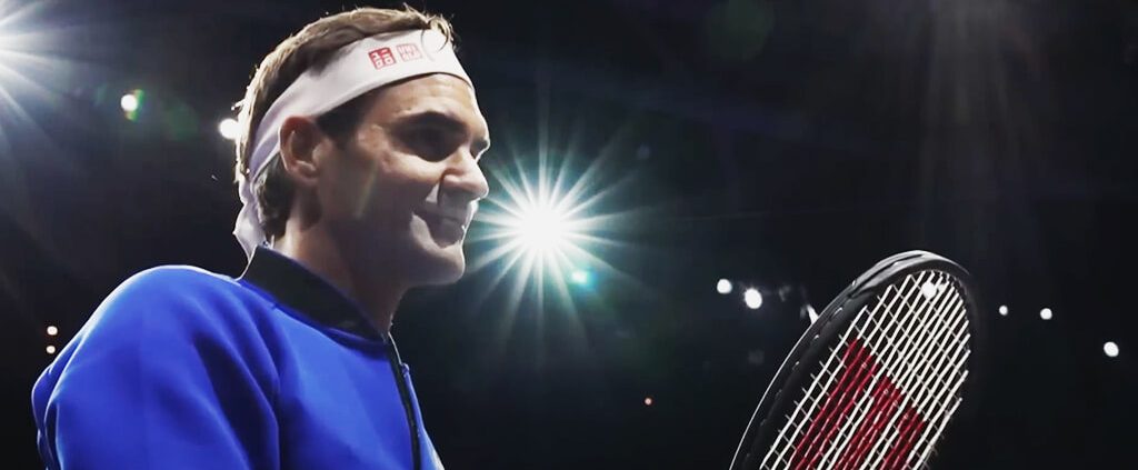 Roger Federer holding the tennis racket