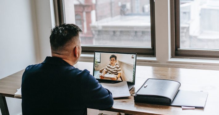 Image of two men on a zoom meeting