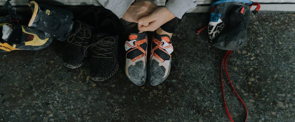 A pair of feet showing a woman is sitting down after excising