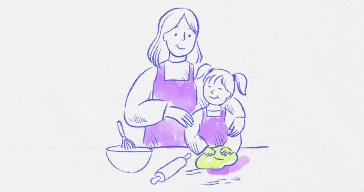 Mom and child baking together